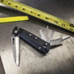 Leatherman FREE K4 Multipurpose Knife -Professional Kitchen Tool Store LT832664 Leatherman Free K4 on Workbench