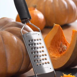 Microplane Gourmet Series Extra Coarse Grater, Black -Professional Kitchen Tool Store MP45008 Microplane Gourmet Extra Coarse Grater with Pumpkin