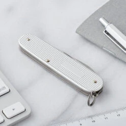 Victorinox Cadet Swiss Army Knife 10 Victorinox Cadet Swiss Army Knife -Professional Kitchen Tool Store SA0260126 Cadet Silver Closed Back Panel Lifestyle