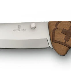 Victorinox Evoke Wood Lockblade Swiss Army Knife With Clip -Professional Kitchen Tool Store SA09415D630 Victorinox Evolve Wood Thumb Stud Detail