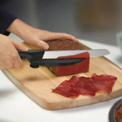 Swiss Classic 8" Serrated DUX-Knife With Adjustable Slicing Guide By Victorinox -Professional Kitchen Tool Store vf6866321 thinslices x1000 f5168284 3453 4254 8e48 9d264357fcf8